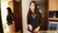 Raising hem of dress over her ass