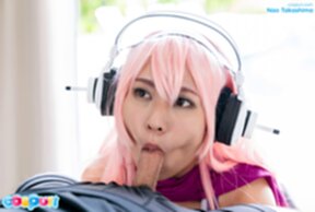 Nao Takashima wearing headset on her knees sucking cock
