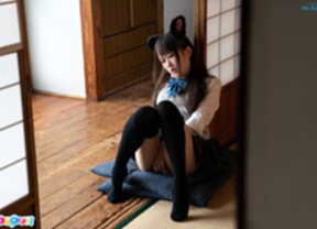 Ria Kurumi in knee high stockings rubbing her pussy