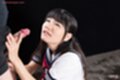 Mamiya tsukushi kneeling in uniform looking up stroking hard cock