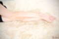 Legs stretched out bare feet