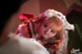 Misa kneeling looking up sucking cock